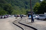 NS yard job E19 comes into view.  A festival in the park to the right of E19 (out of view) drew lots of people to the riverfront this day